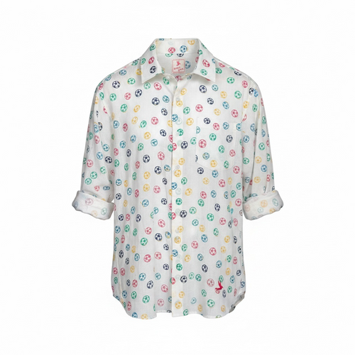 A white long-sleeve button-up shirt with a colorful pattern of small colourful footballs shown on a plain white background.
