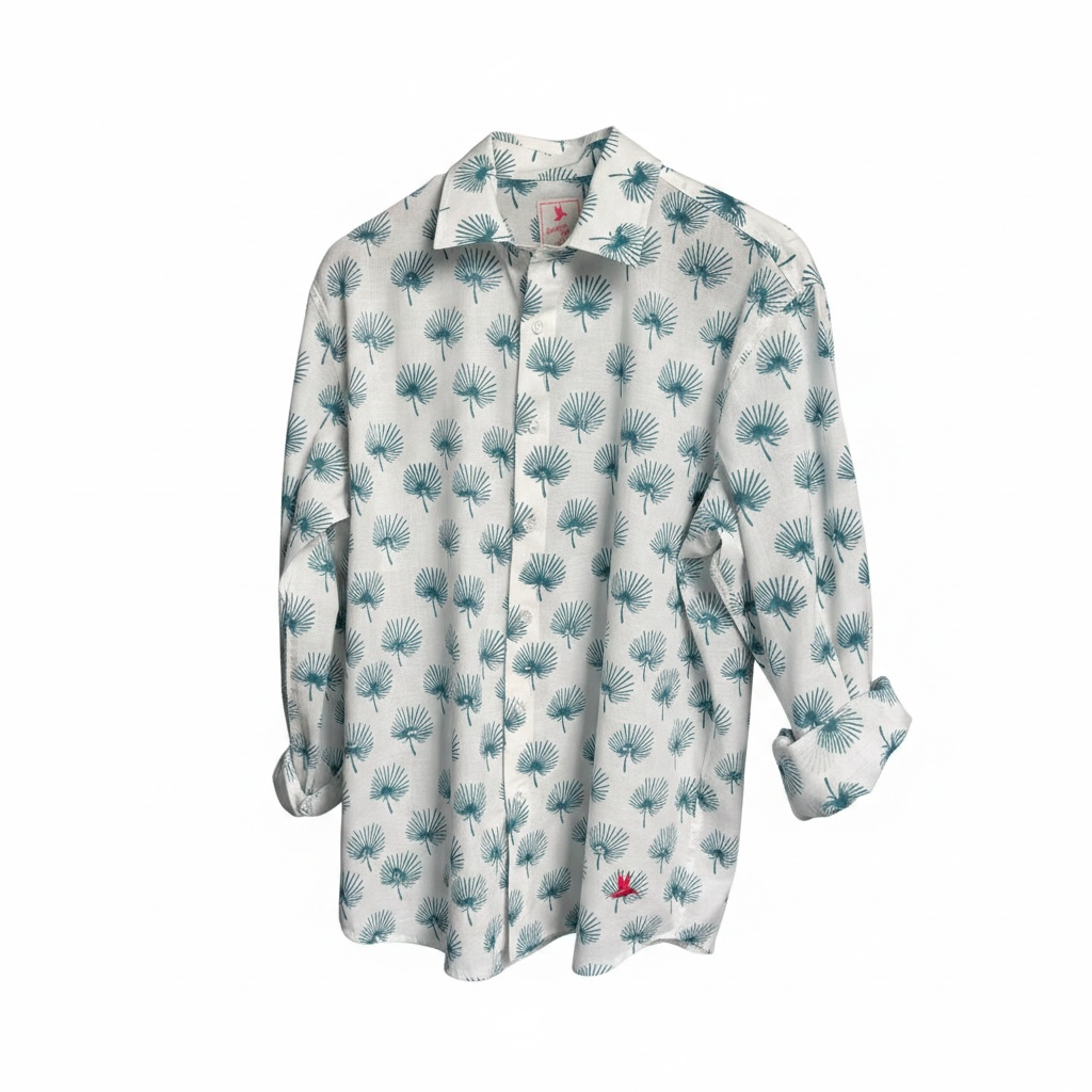 A long-sleeve button-up shirt with a white base and an all-over teal palm frond pattern, featuring a small red embroidered sunbird near the lower hem.